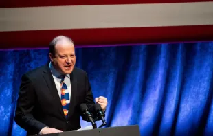 Colorado Gov. Jared Polis introduces U.S. Vice President Kamala Harris, not pictured, at the start of a climate crisis event at the Arvada Center for Performing Arts in Arvada, Colorado, on March 6, 2023. Jason Connolly/AFP via Getty Images