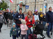 A family participates in Poland's March for Life and the Family in Warsaw on Sept. 19, 2021.