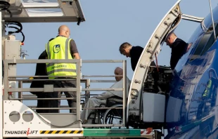 Pope Francis prepares to board an ITA Airlines plane for his approximately 10-hour flight from Rome to Edmonton in western Canada on July 24, 2022. Daniel Ibañez/CNA