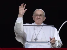 Pope Francis waves to crowds gathered in St. Peter's Square on June 19, 2022, on Corpus Christi Sunday.