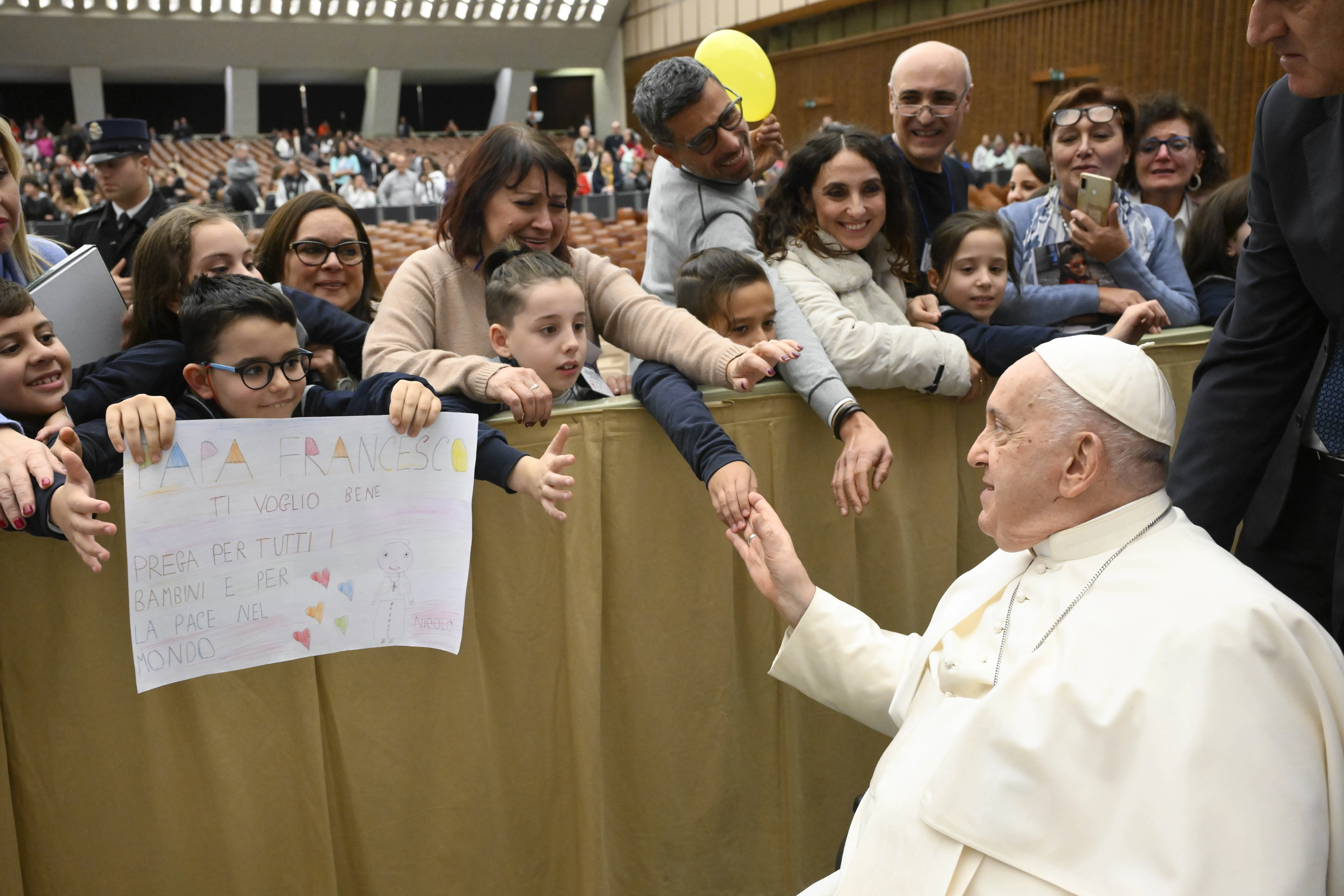 Pope Francis greets members of the public attending his weekly general audience in Paul VI Hall in Vatican City on Nov. 29, 2023.?w=200&h=150