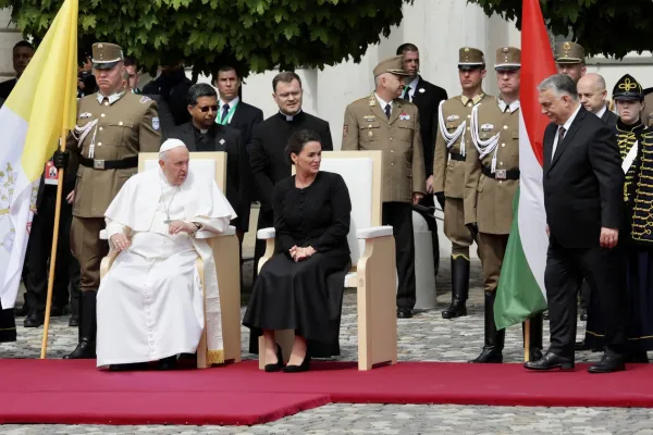 Pope Francis appears at a welcoming ceremony with Hungary’s President Katalin Novák (immediate right) and Prime Minister Viktor Orbán (standing at far right) after arriving in Budapest on April 28, 2023. Daniel Ibañez/CNA