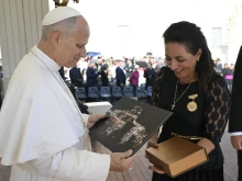 Pope Leo XIV greets a pilgrim at an Oct. 31, 2025, audience with teachers held as part of Jubilee of the World of Education.