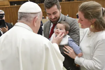Pope Francis with married couple