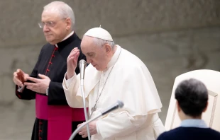 Pope Francis prays at the general audience in Paul VI Hall on Feb. 16, 2022. Daniel Ibanez/CNA