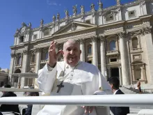 Pope Francis waves to pilgrims gathered in St. Peter’s Square for his Wednesday general audience on March 20, 2024.