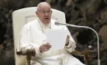 Pope Francis delivers a message during his general audience on Wednesday, May 1, 2024, in Paul VI Hall at the Vatican.