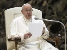 Pope Francis delivers a message during his general audience on Wednesday, May 1, 2024, in Paul VI Hall at the Vatican.