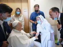 Pope Francis greets staff at the Gemelli Hospital in Rome, July 11, 2021