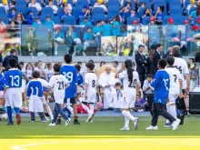 Pope Francis watches a friendly soccer game between Italian professional soccer players with children clad in uniforms as part of the first World Children’s Day on May 25, 2024, at Olympic Stadium in Rome.
