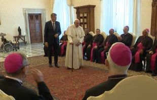 Pope Francis walks with a cane at the beginning of a meeting with Brazilian bishops on June 27, 2022. Vatican Media