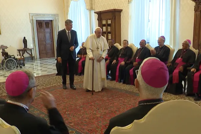 Pope Francis walks with a cane at the beginning of a meeting with Brazilian bishops on June 27, 2022.