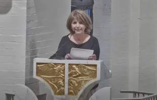 Ruth Prats offers a reflection on her relationship with Father Otis Young before Mass in June 2022. Screenshot of YouTube video