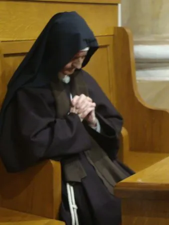 A nun prays in the Monastery of Città della Pieve in Italy. Credit: Monastery of Città della Pieve