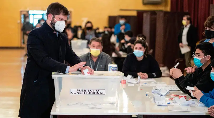 President Gabriel Bóric of Chile votes in a Sept. 4, 2022, election for proposed changes to the country’s constitution.