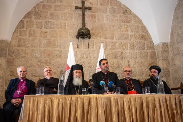 The Patriarchs and Heads of the Churches in Jerusalem during a press conference, Oct. 18, 2023. From left to right: H.E. Sani Ibahim Azar, bishop of the Evangelical Lutheran Church in Jordan and the Holy Land; Father Francesco Patton, custos of the Holy Land; Theophilos III, Greek Orthodox patriarch of Jerusalem; H.E. Hosam Naum, bishop of the Episcopal Diocese of Jerusalem; Cardinal Pierbattista Pizzaballa, Latin patriarch of Jerusalem; H.E. Mor Anthimos Jack Yacoub, Syriac Orthodox archbishop of Jerusalem. Credit: Marinella Brandini