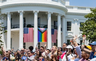 The Progress Pride flag is shown above (center flag) at a White House "Pride" celebration on June 10, 2023. Credit: The White House, public domain, via Wikimedia Commons