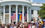 The Progress Pride flag is shown above (center flag) at a White House "Pride" celebration on June 10, 2023.