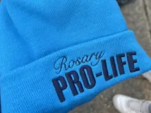 Twelve students from Our Lady of the Rosary School in Greenville, South Carolina, and their chaperones wore blue pro-life stocking caps that said “Rosary Pro-Life” to the Smithsonian Air and Space Museum after they attended the March for Life in Washington, D.C., on Jan. 20, 2023.