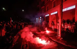 Demonstrators threw smoke bombs, smashed windows, and spray-painted pro-abortion graffiti on the Pro Vita & Famiglia association’s main office in Rome on Nov. 25, 2023, despite the presence of Italian police at the protest. Credit: Courtesy of Pro Vita & Famiglia