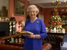 Queen Elizabeth II films her traditional Christmas broadcast to the Commonwealth from Buckingham Palace on Dec. 19, 2001 in London, England.