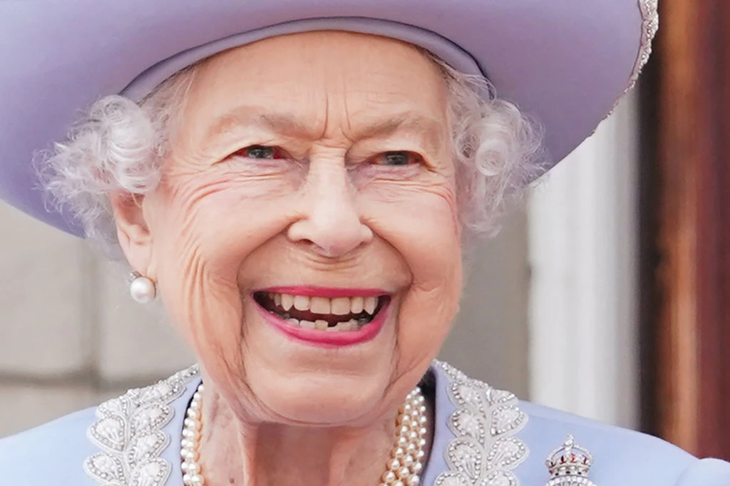 Britain's Queen Elizabeth II stands on the Balcony of Buckingham Palace as the troops march past during the Queen's Birthday Parade, the Trooping the Colour, as part of Queen Elizabeth II's platinum jubilee celebrations, in London on June 2, 2022.?w=200&h=150
