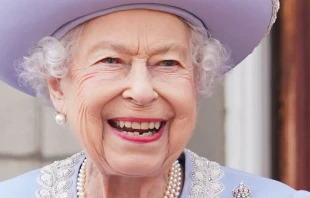 Britain's Queen Elizabeth II stands on the Balcony of Buckingham Palace as the troops march past during the Queen's Birthday Parade, the Trooping the Colour, as part of Queen Elizabeth II's platinum jubilee celebrations, in London on June 2, 2022. Jonathan Brady/Getty Images