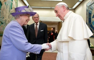 Queen Elizabeth greets Pope Francis at the Vatican in 2014. Vatican Media