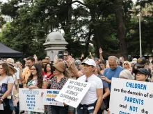 About 1,000 Californians rallied in front of the state capitol steps in Sacramento on Aug. 21, 2023, to protest a series of bills they say would take away their rights as parents.