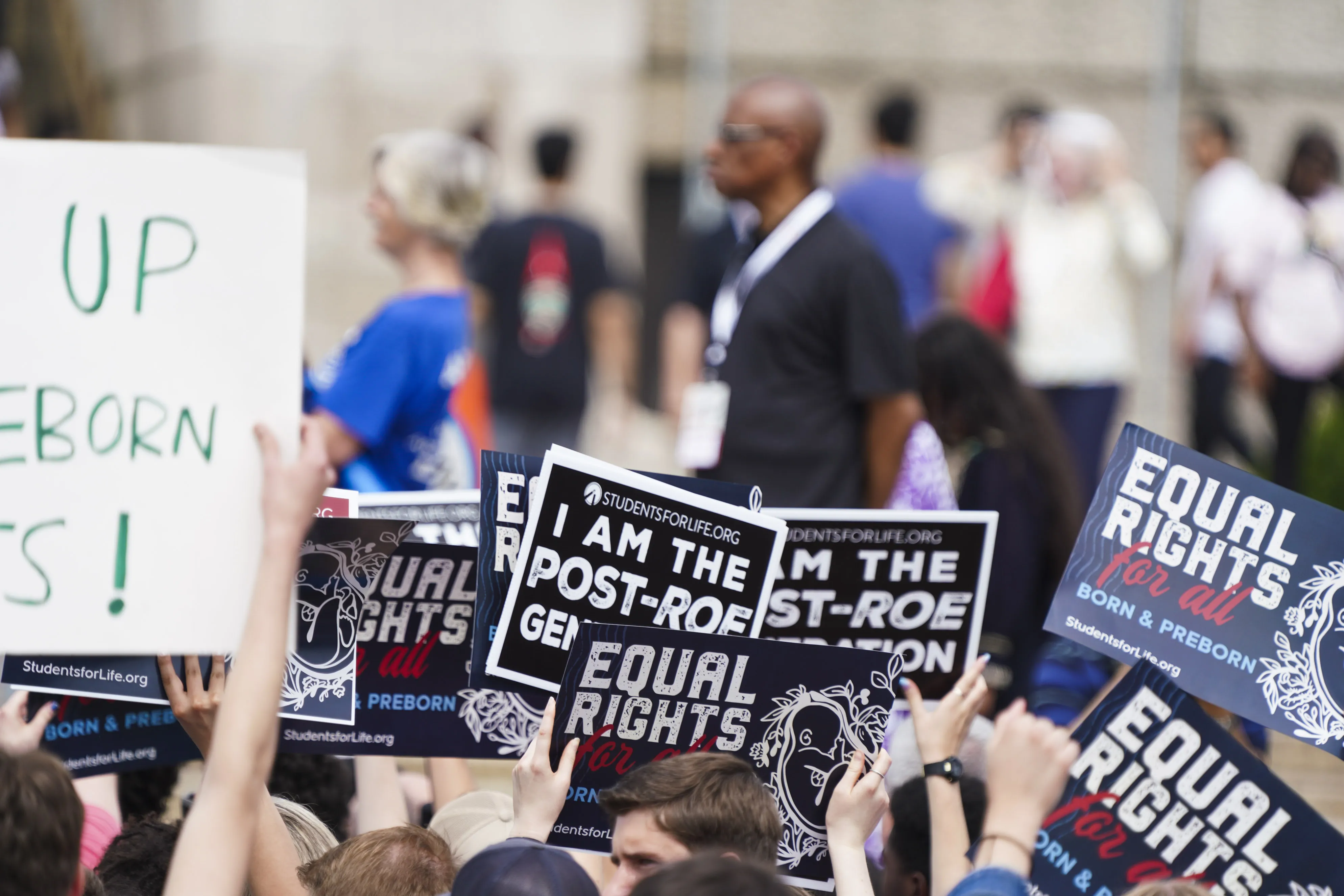 Participants in a pro-life rally hold signs in front of the Lincoln Memorial in Washington, D.C., on June 24, 2023, at a rally marking the first anniversary of the Supreme Court's Dobbs decision that overturned Roe v. Wade.?w=200&h=150