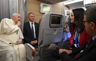 Pope Francis speaking with journalists on the papal plane on July 30. Vatican Media