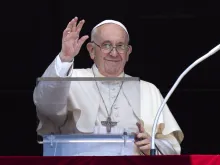 Pope Francis waves during his Sunday Angelus message and prayer on July 17, 2022