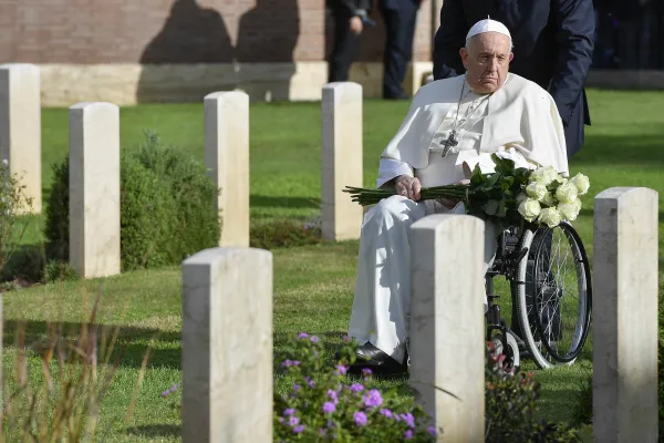Before the Mass he presided over at the Rome War Cemetery on Nov. 2, 2023, , Pope Francis passed through the cemetery in prayer, pushed in a wheelchair. Credit: Vatican Media