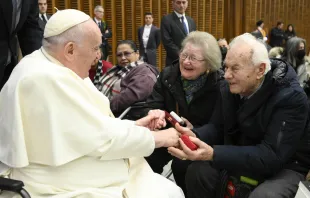 Pope Francis greets an elderly couple at his general audience on Jan. 11, 2023. Credit: Vatican Media
