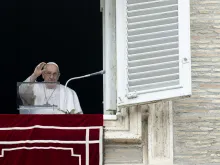 Pope Francis greets the crowd at his Angelus address on Feb. 19, 2023.