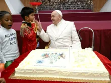 Pope Francis celebrates his birthday on Dec. 17, 2023, with children and families who are assisted by the Vatican’s Santa Marta Pediatric Dispensary.