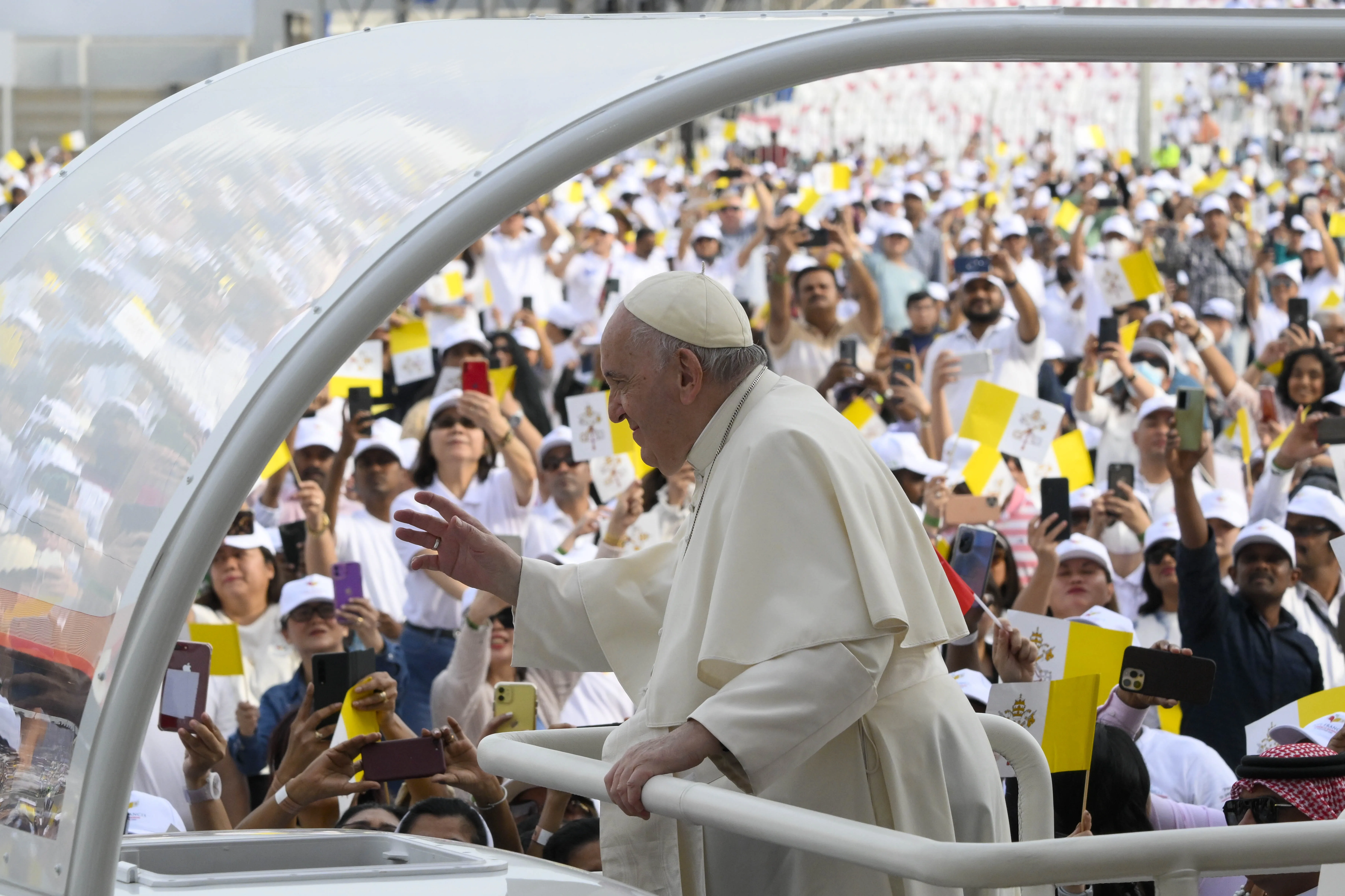 Pope Francis greets the crowd in Bahrain's national soccer stadium before offering Mass on Nov. 5, 2022.?w=200&h=150