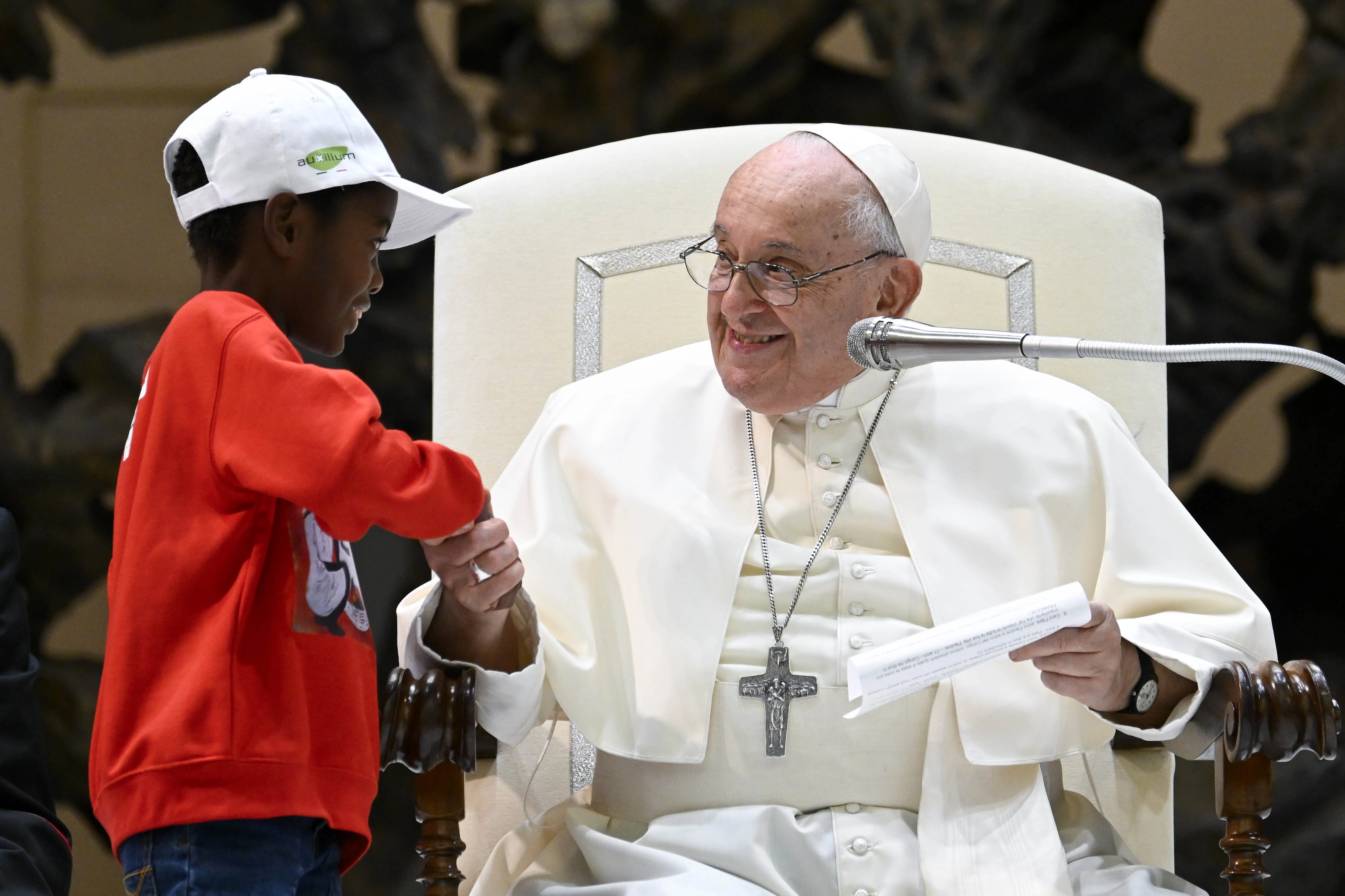 Pope Francis shakes hands with one of the approximately 7,000 children from around the world in the Vatican’s Paul VI Hall on Nov. 6, 2023, at an event sponsored by the Dicastery for Culture and Education dedicated to the theme “Let us learn from boys and girls.”?w=200&h=150