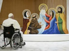 Pope Francis gazes at a nativity scene during a meeting with two delegations at the Vatican Dec. 9, 2023 — a community from Macra, located in the Alps who provided this year’s Christmas tree, and people from the Diocese of Rieti, who donated this year's Nativity scene.