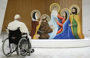 Pope Francis gazes at a nativity scene during a meeting with two delegations at the Vatican Dec. 9, 2023 — a community from Macra, located in the Alps who provided this year’s Christmas tree, and people from the Diocese of Rieti, who donated this year's Nativity scene. Credit: Vatican Media