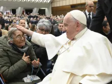 Pope Francis greets pilgrims at his general audience in Paul VI Hall on Feb. 15, 2023.