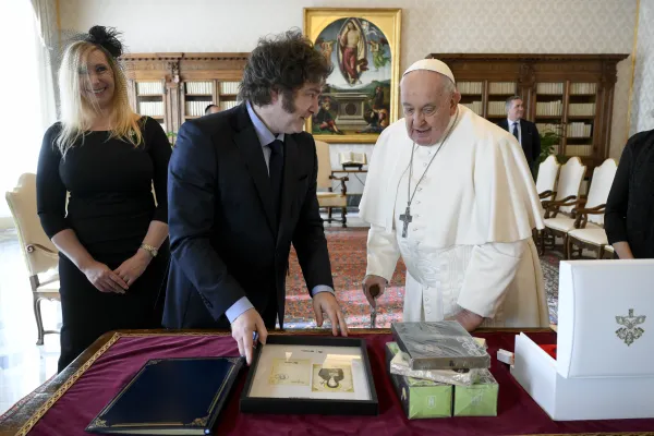 Argentina President Javier Milei presents Pope Francis with gifts during their meeting Feb. 12, 2024, at the Vatican. Credit: Vatican Media