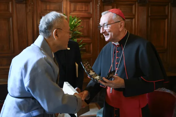 Vatican Secretary of State Cardinal Pietro Parolin greets Yu In-Chon, the current minister of culture, sports, and tourism for South Korea at a Dec. 11, 2023, event to mark the 60th anniversary of diplomatic relations between the two states. Credit: Vatican Media