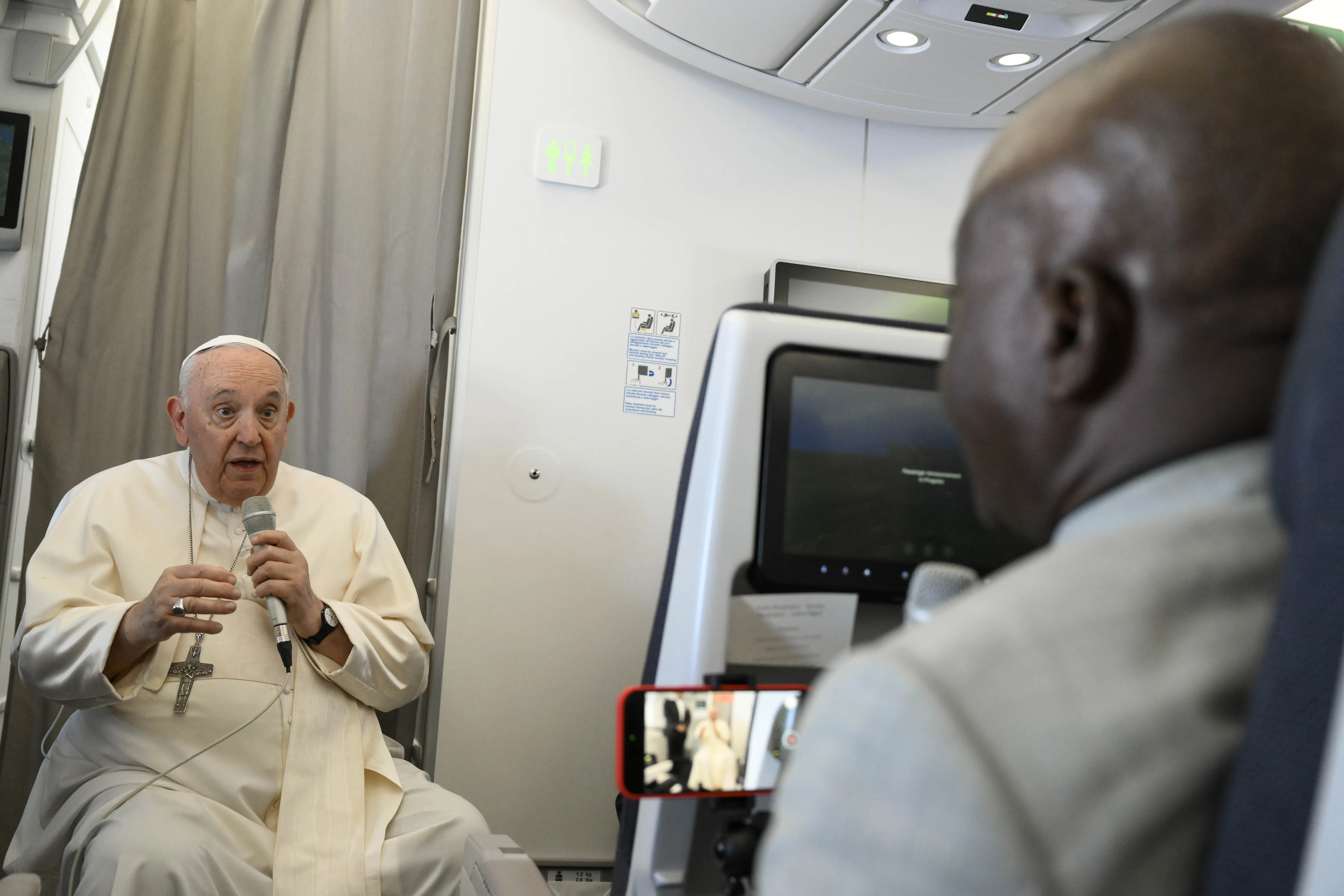 Pope Francis speaks to journalists on Feb. 5, 2023, during his flight back to Rome after his visit to the Democratic Republic of Congo and South Sudan.?w=200&h=150