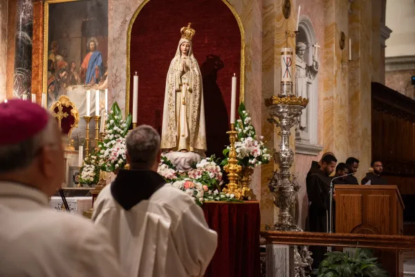 The Custos of the Holy Land, Father Francesco Patton, standing before the statue of Our Lady of Fatima, during the "Rosary for peace" in St. Saviour's Church, Jerusalem, Oct. 14, 2023. Credit: Marinella Bandini