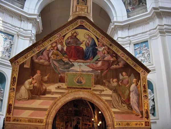 Fresco “St. Francis receiving the Pardon of Assisi” by Friedrich Overbeck (1829), over the entrance of the Portiuncola in the Basilica of Santa Maria degli Angeli, Assisi, Italy. Credit: Georges Jansoone JoJan, CC BY-SA 3.0, via Wikimedia Commons
