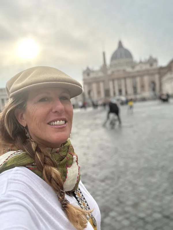 Susan Agostinelli snaps a selfie in front of St. Peter's Basilica during a visit to Rome in October 2022. Credit: Susan Agostinelli