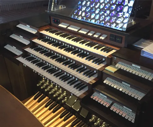 Saint John’s Abbey organ console. Martin Pasi did a project expanding the abbey organ beginning in 2019 and after coming to know the monks, came up with the idea of moving his organ-building operation there.?w=200&h=150