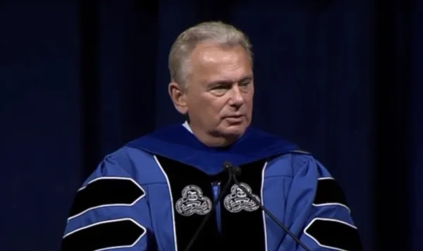 "Wheel of Fortune" host Pat Sajak speaks at the Hillsdale College graduation ceremony on May 17, 2019, in his first year as chairman of the board of trustees at the college, located in Hillsdale, Michigan. Credit: YouTube/Hillsdale College