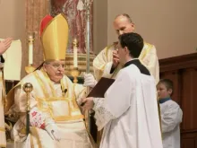 Cardinal Raymond Burke celebrates his first public Mass Dec. 11 since his hospitalization with COVID-19.